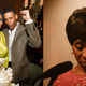 Aretha Franklin and her son Kecalf Cunningham attend her 72nd birthday celebration on Sunday, March 23, 2014; Cynthia Erivo as Aretha Franklin in Genius: Aretha (2021).